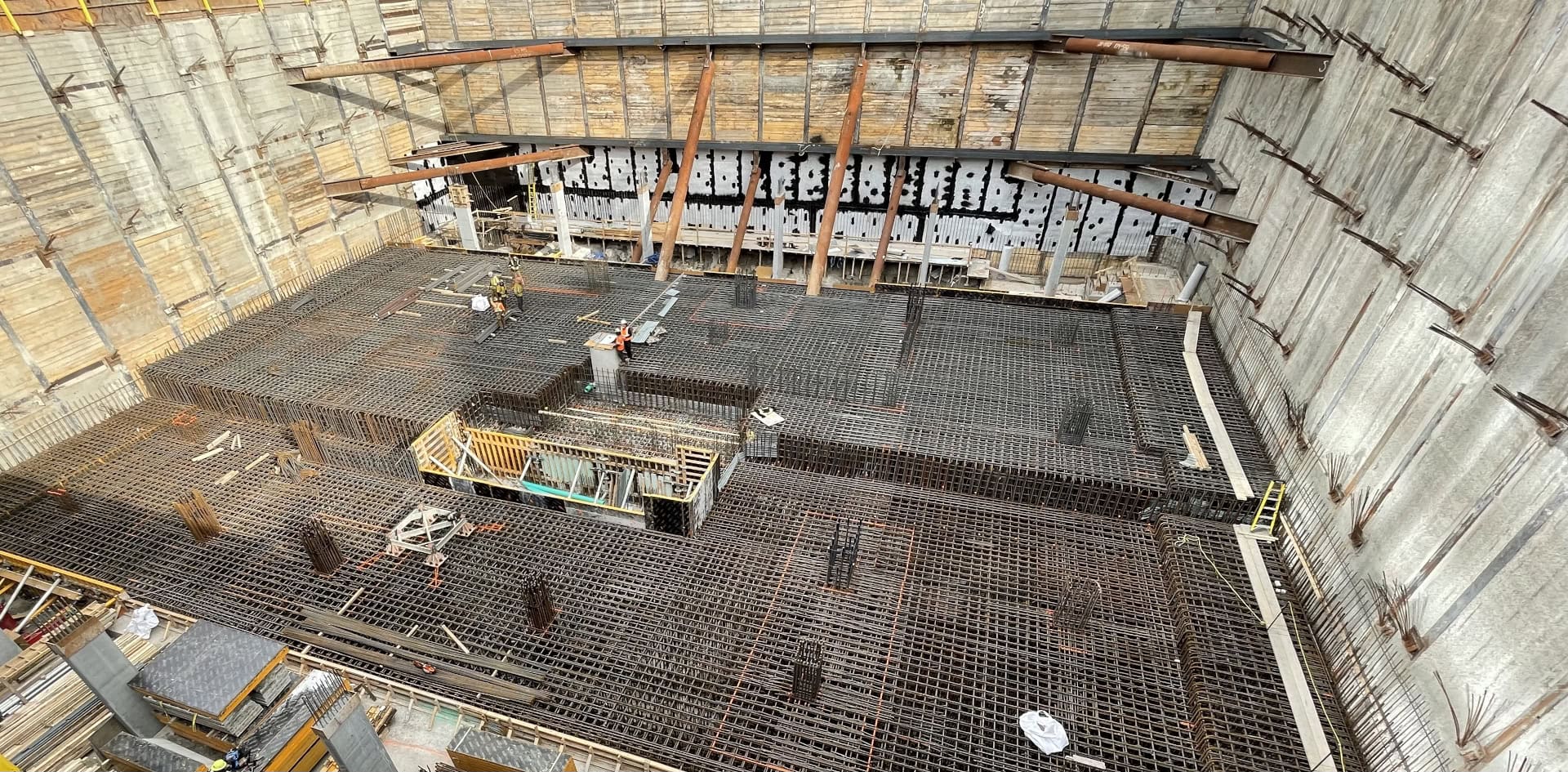 Contact Page – Underground Parking Contstruction Construction of underground parking with metal bars laid for cement re-enforcement